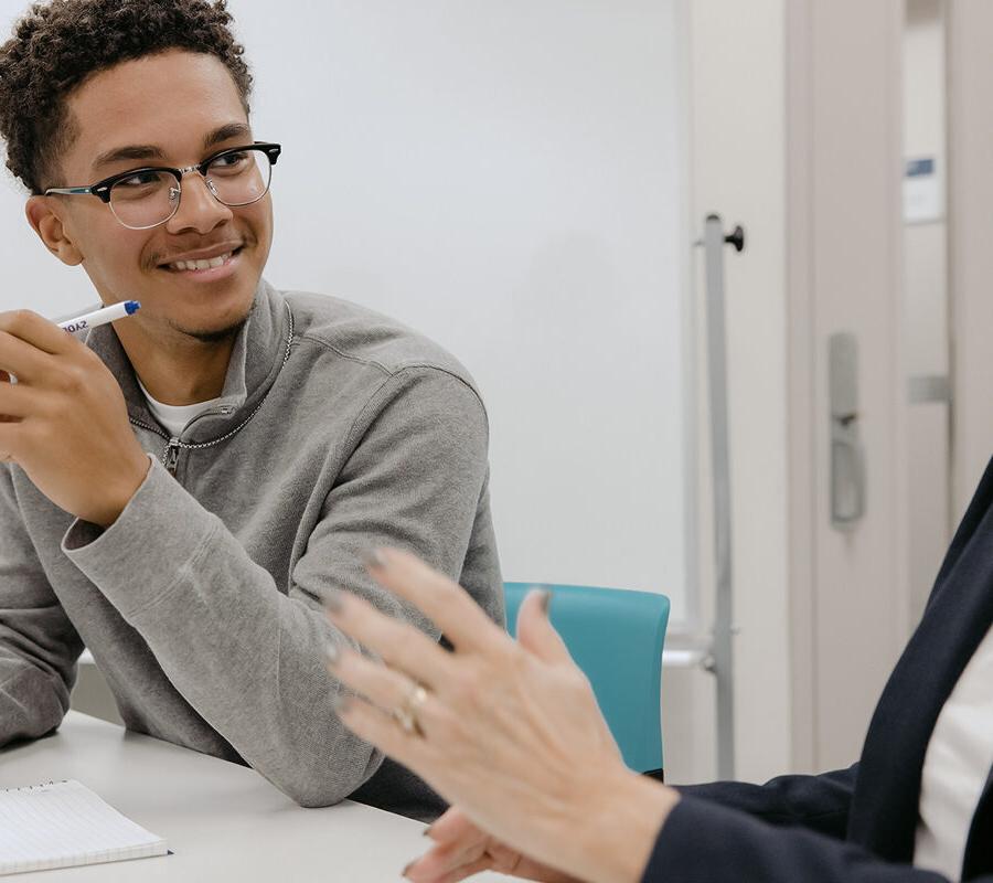 Mathematics student engages in classroom discussion.